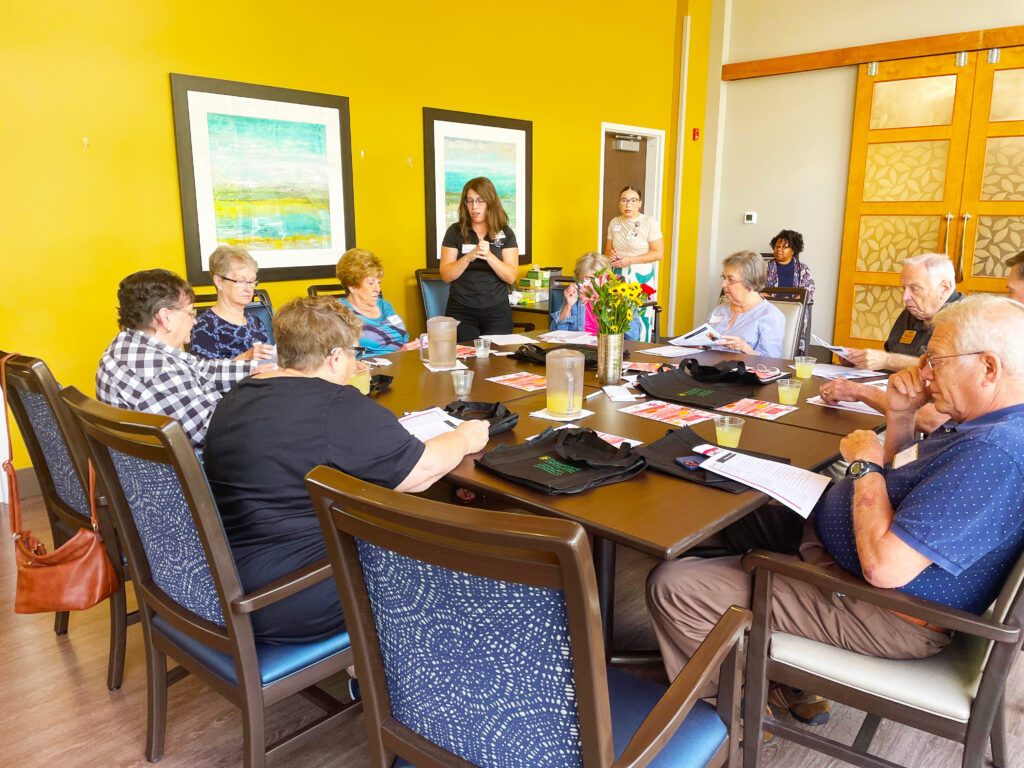 Group of people participating in a caregiver support group
