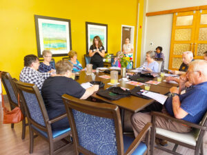 Group of people participating in a caregiver support group